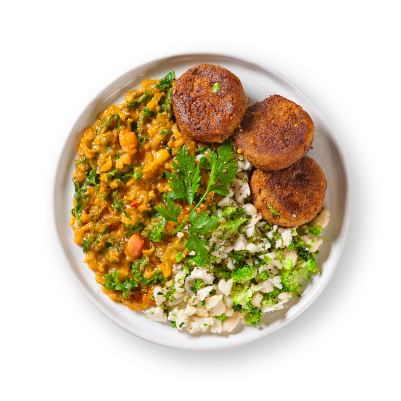 Organic Vegetable Fritters with Kale Dahl & Broccoli and Cauliflower Rice
